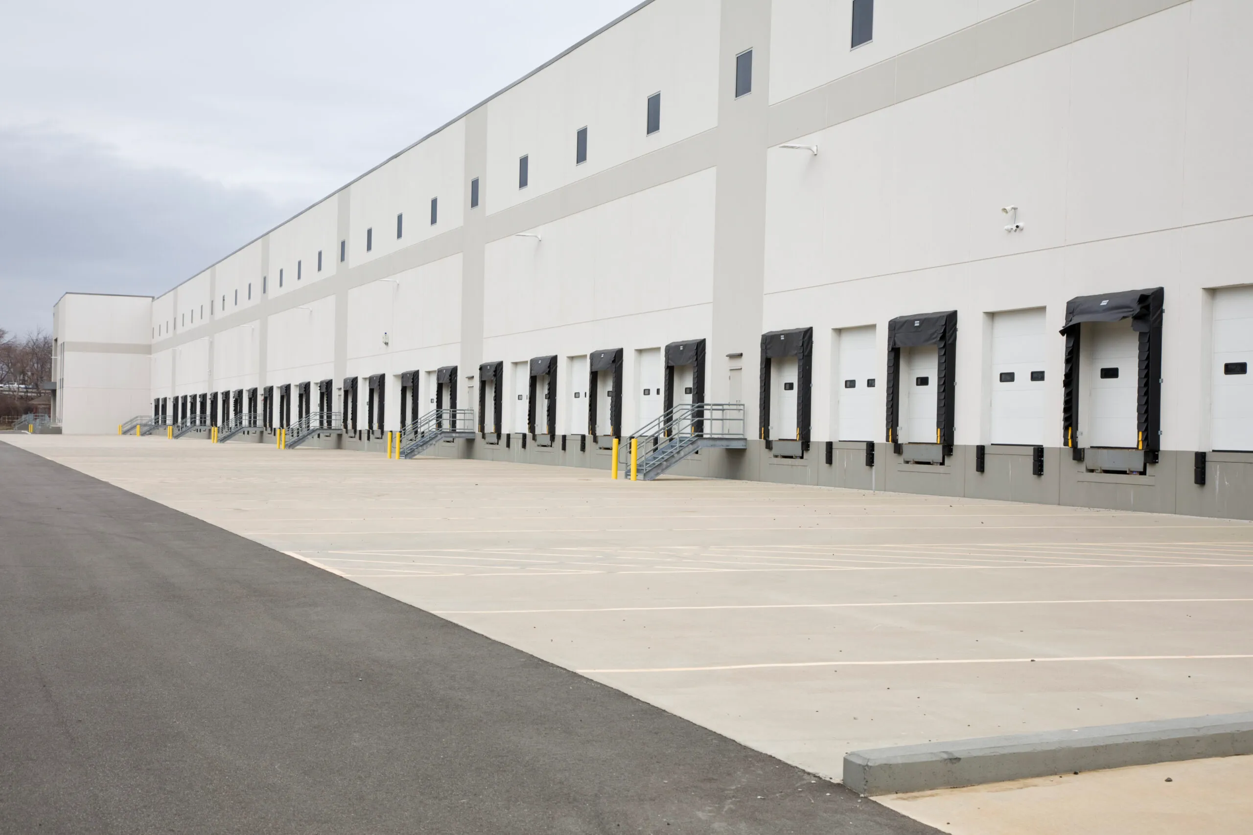 Row of loading dock doors at a distribution warehouse